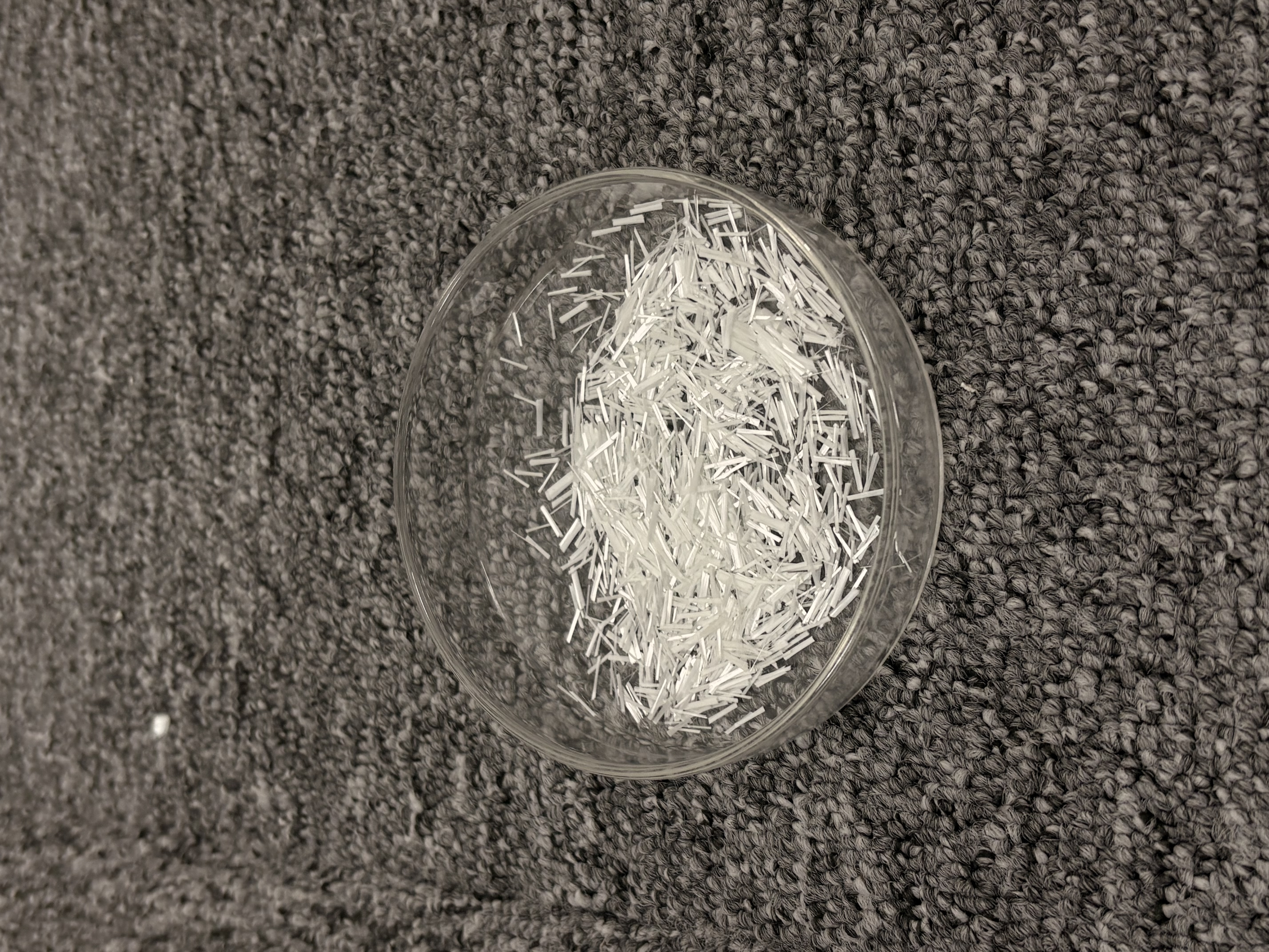 Alkali-resistant chopped fibers for plastic shrinkage crack control