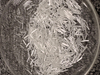 Alkali-resistant chopped fibers for plastic shrinkage crack control